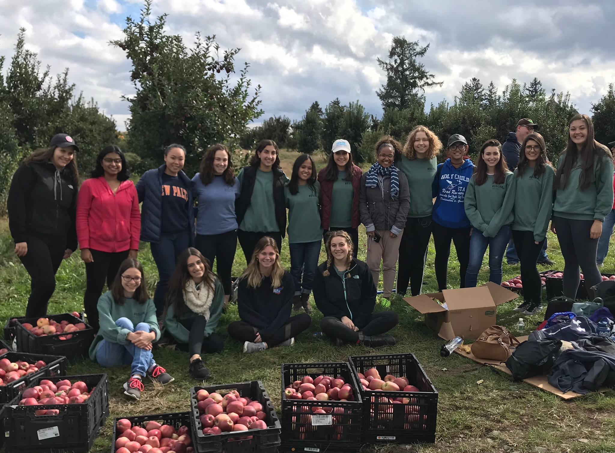 NSSLHA members with apples picked on Make a Difference Day